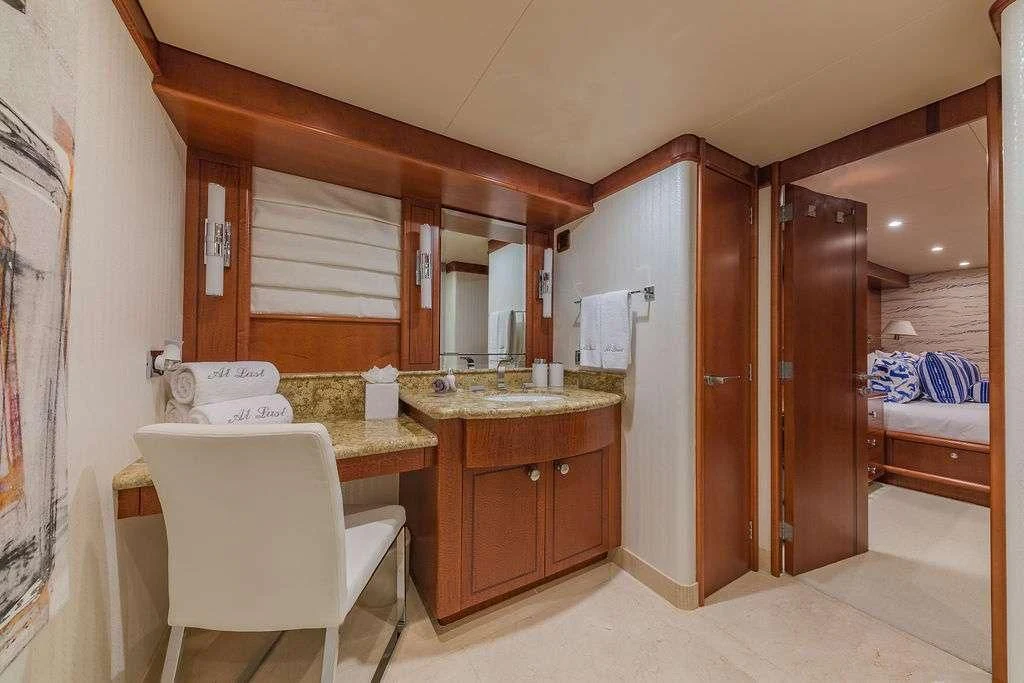 a bathroom with a sink and a bathtub aboard AT LAST Yacht for Charter