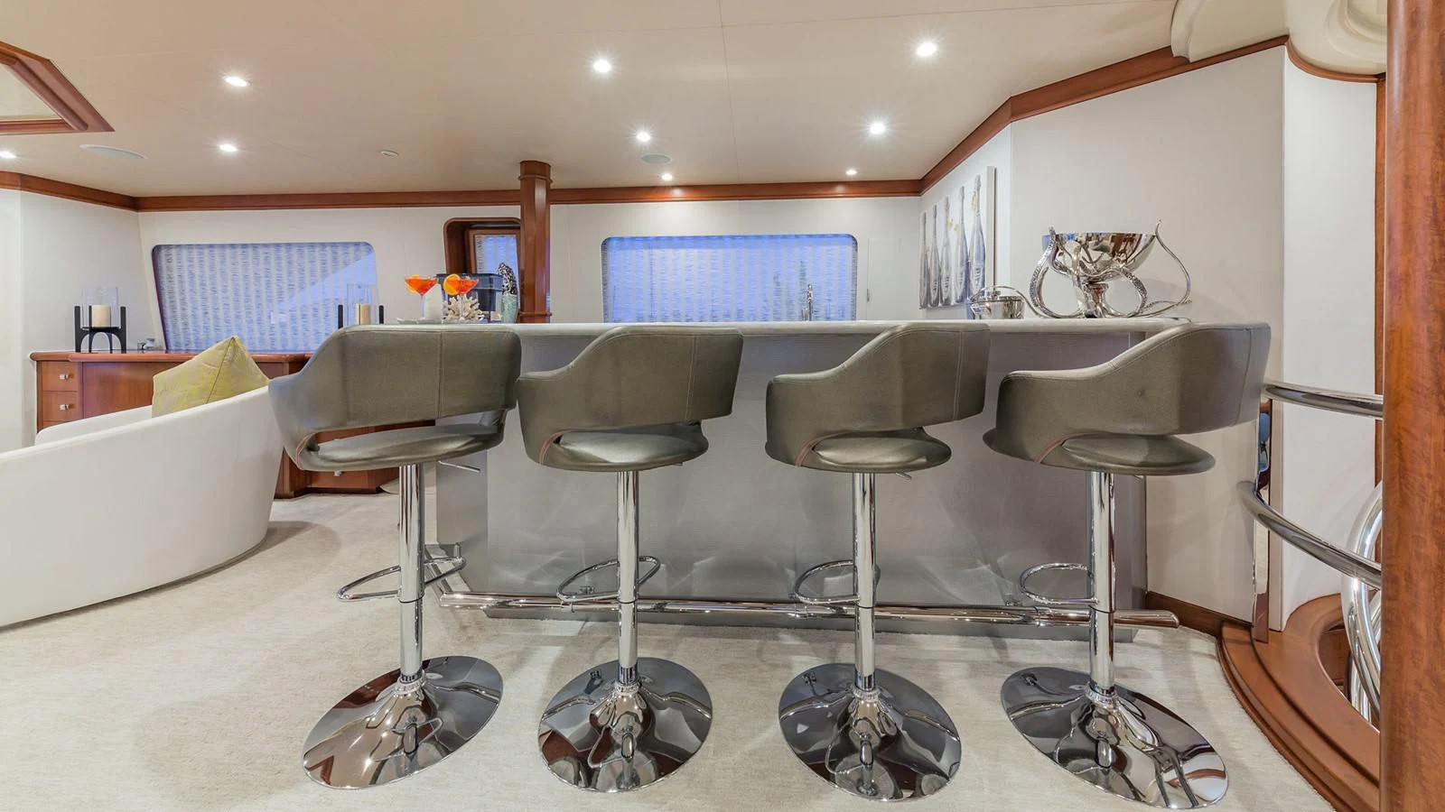 a room with a table and chairs aboard AT LAST Yacht for Charter