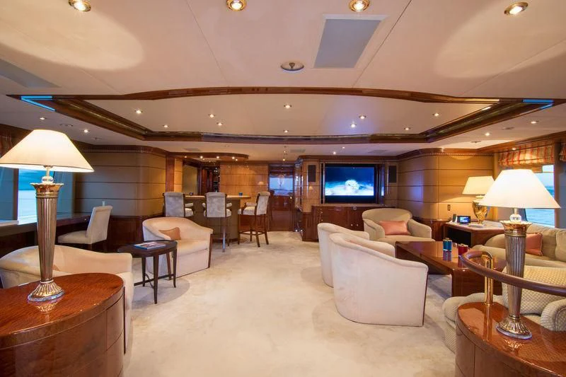 a living room with a large television aboard ZEFZAF Yacht for Sale