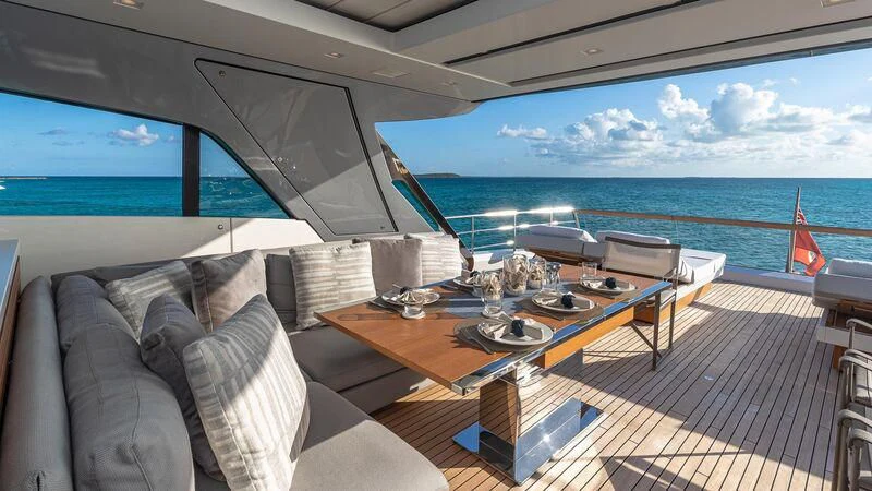 a room with a table and chairs aboard NO MATTER WHAT Yacht for Charter