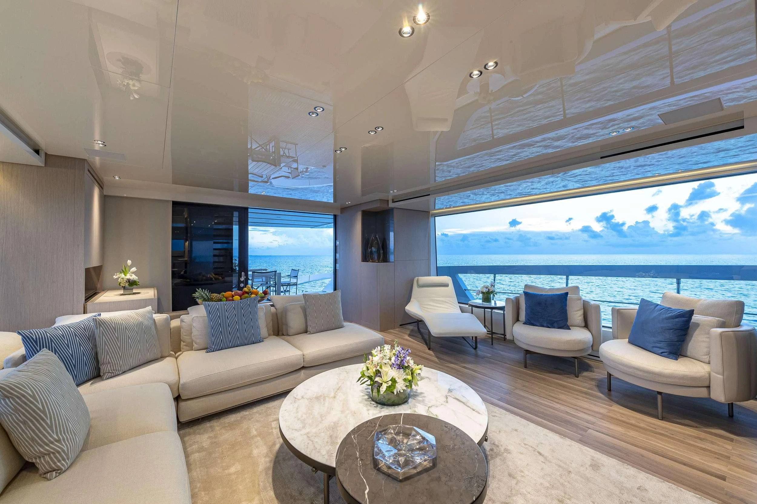 a living room with a large window aboard NO MATTER WHAT Yacht for Charter