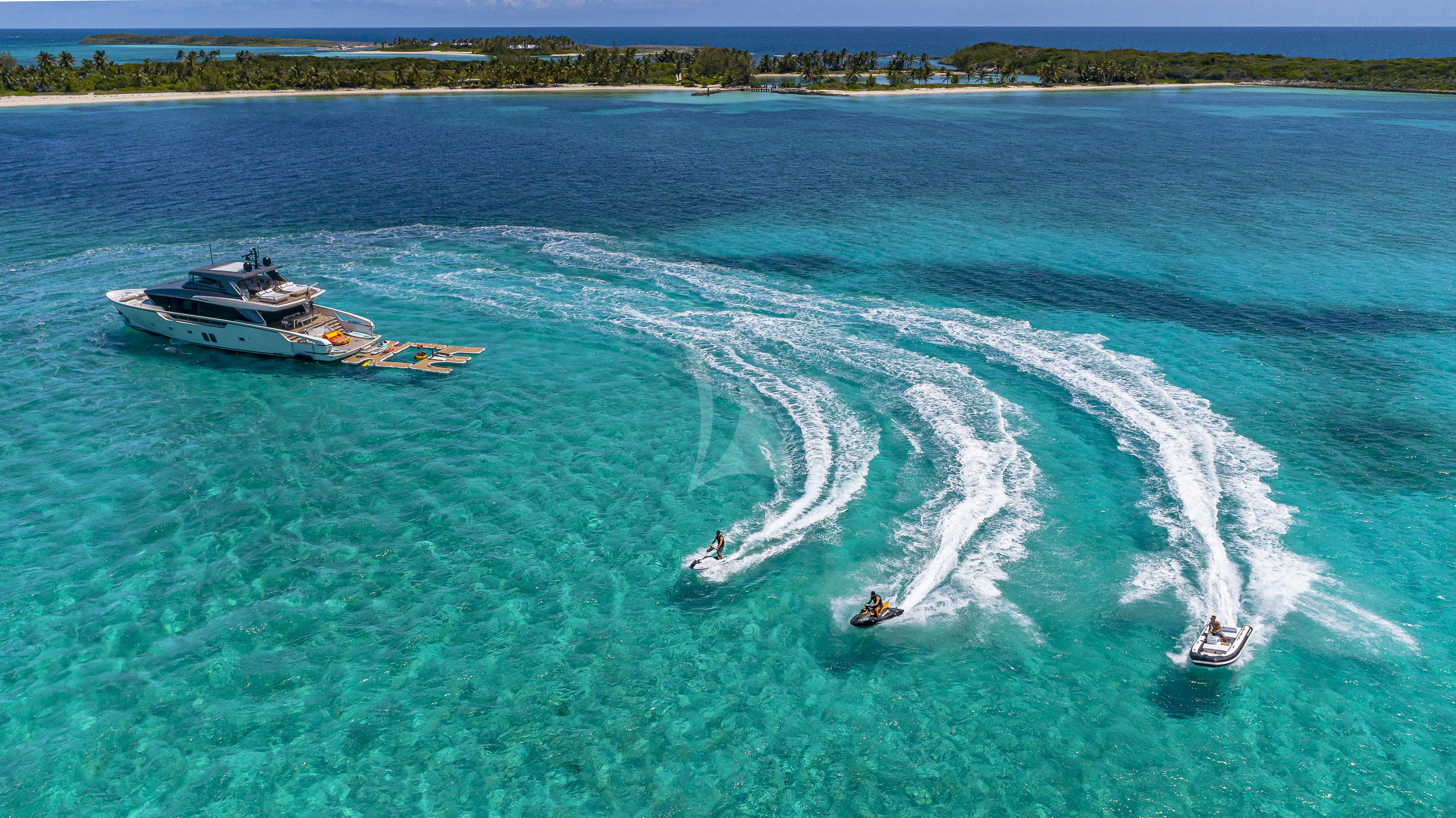 a boat and a helicopter on the water aboard NO MATTER WHAT Yacht for Charter