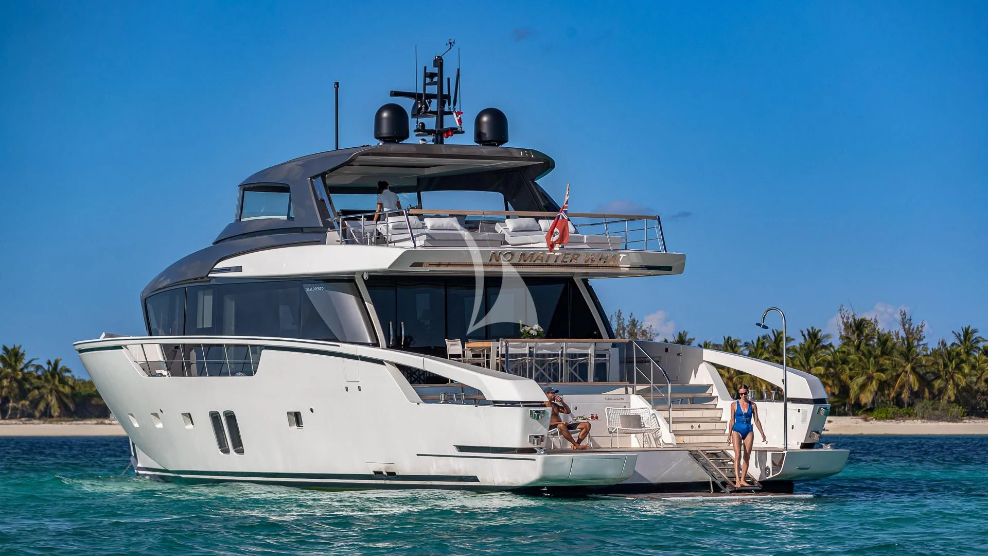 a white boat in the water aboard NO MATTER WHAT Yacht for Charter