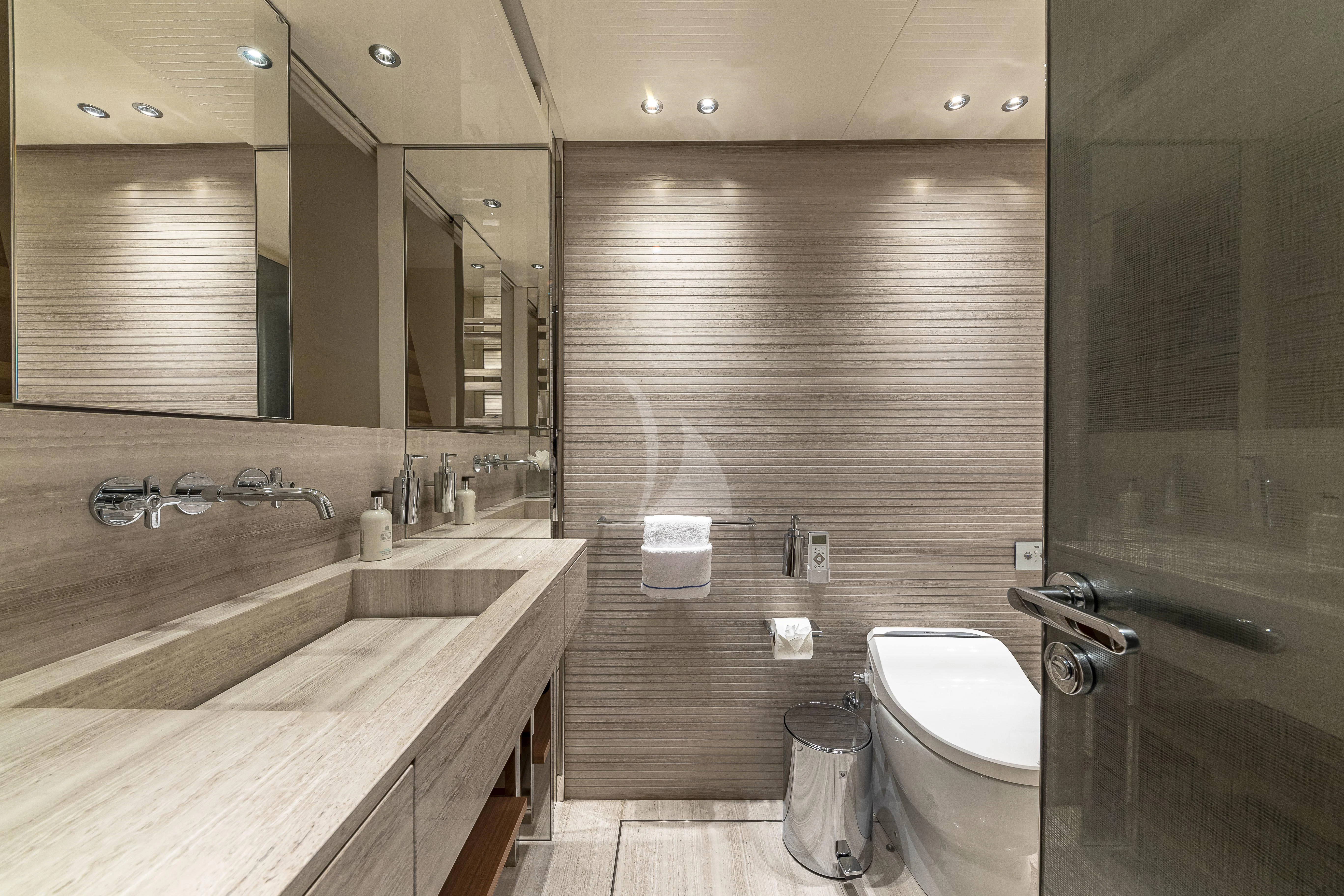 a bathroom with a sink toilet and a shower aboard NO MATTER WHAT Yacht for Charter