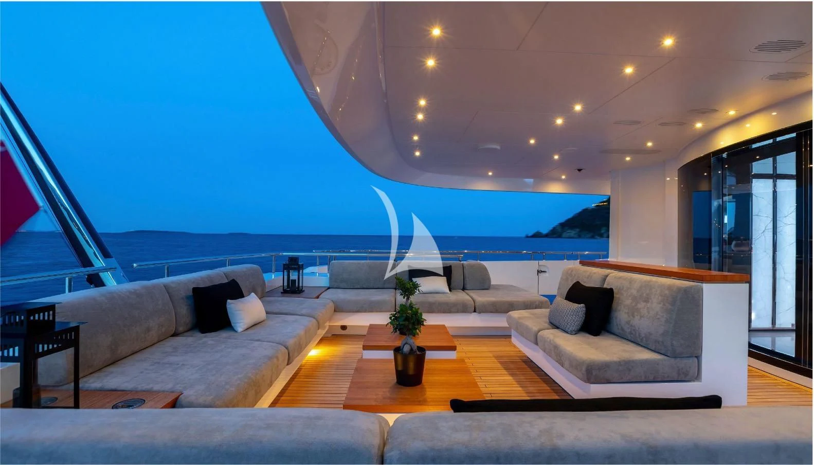 a living room with a large window aboard PEARL Yacht for Sale