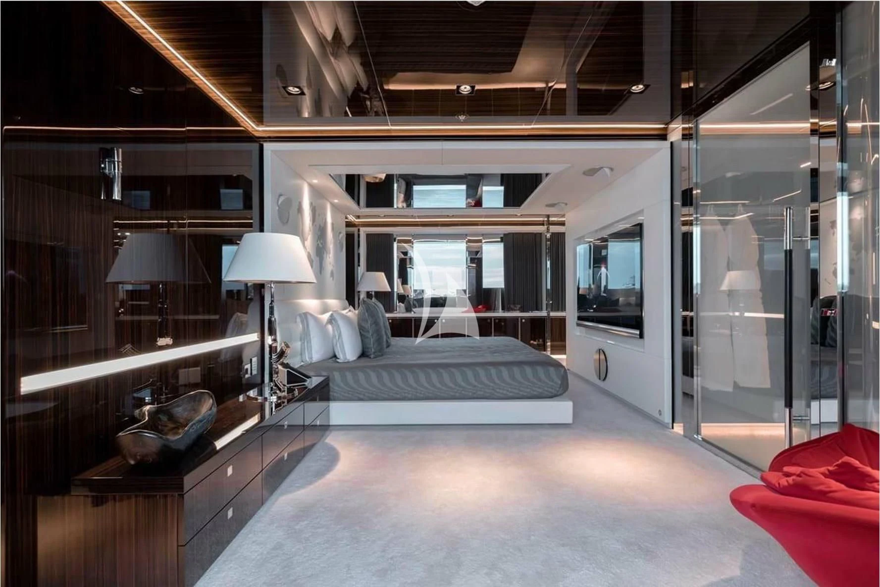 a room with a bed and a desk aboard PEARL Yacht for Sale