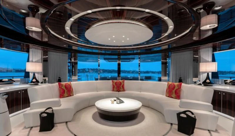 a large white couch in a room aboard PEARL Yacht for Sale