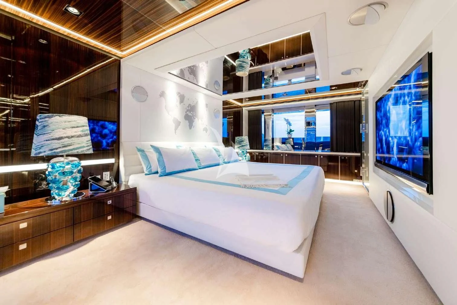 a room with a bed and a window aboard PEARL Yacht for Sale