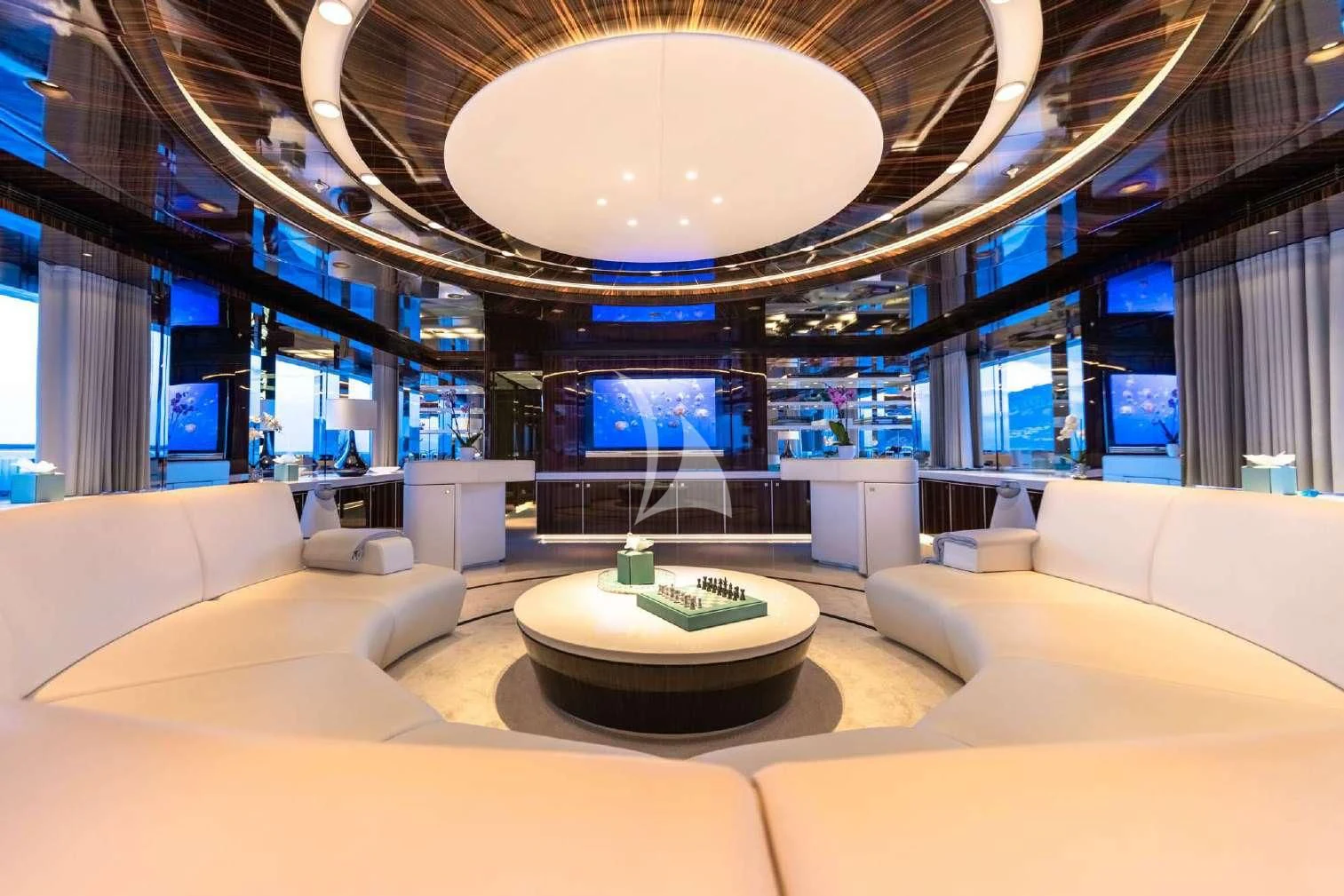 a room with a large chandelier aboard PEARL Yacht for Sale