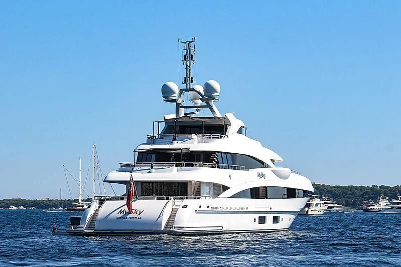 a large white boat in the water aboard PEARL Yacht for Sale