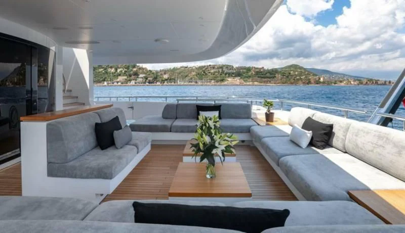a living room with a large body of water aboard PEARL Yacht for Sale