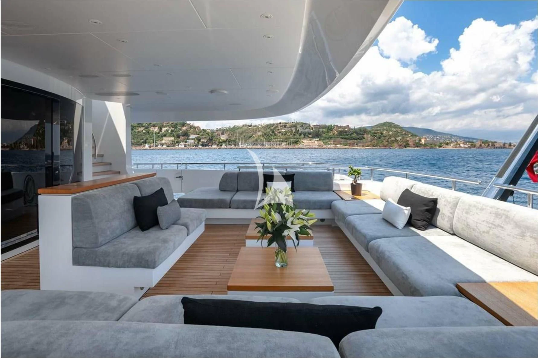 a living room with a large body of water aboard PEARL Yacht for Sale