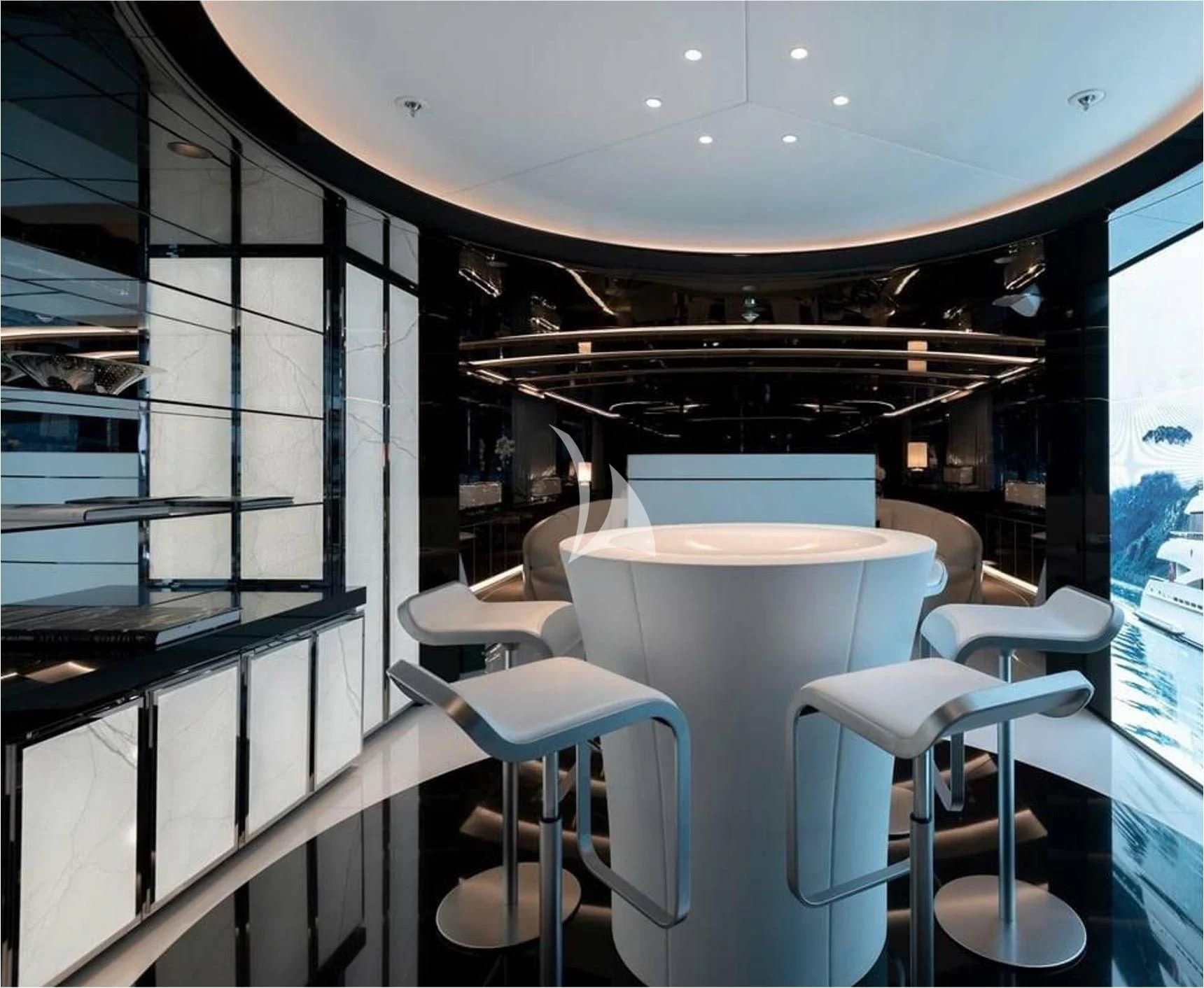 a room with chairs and a table aboard PEARL Yacht for Sale