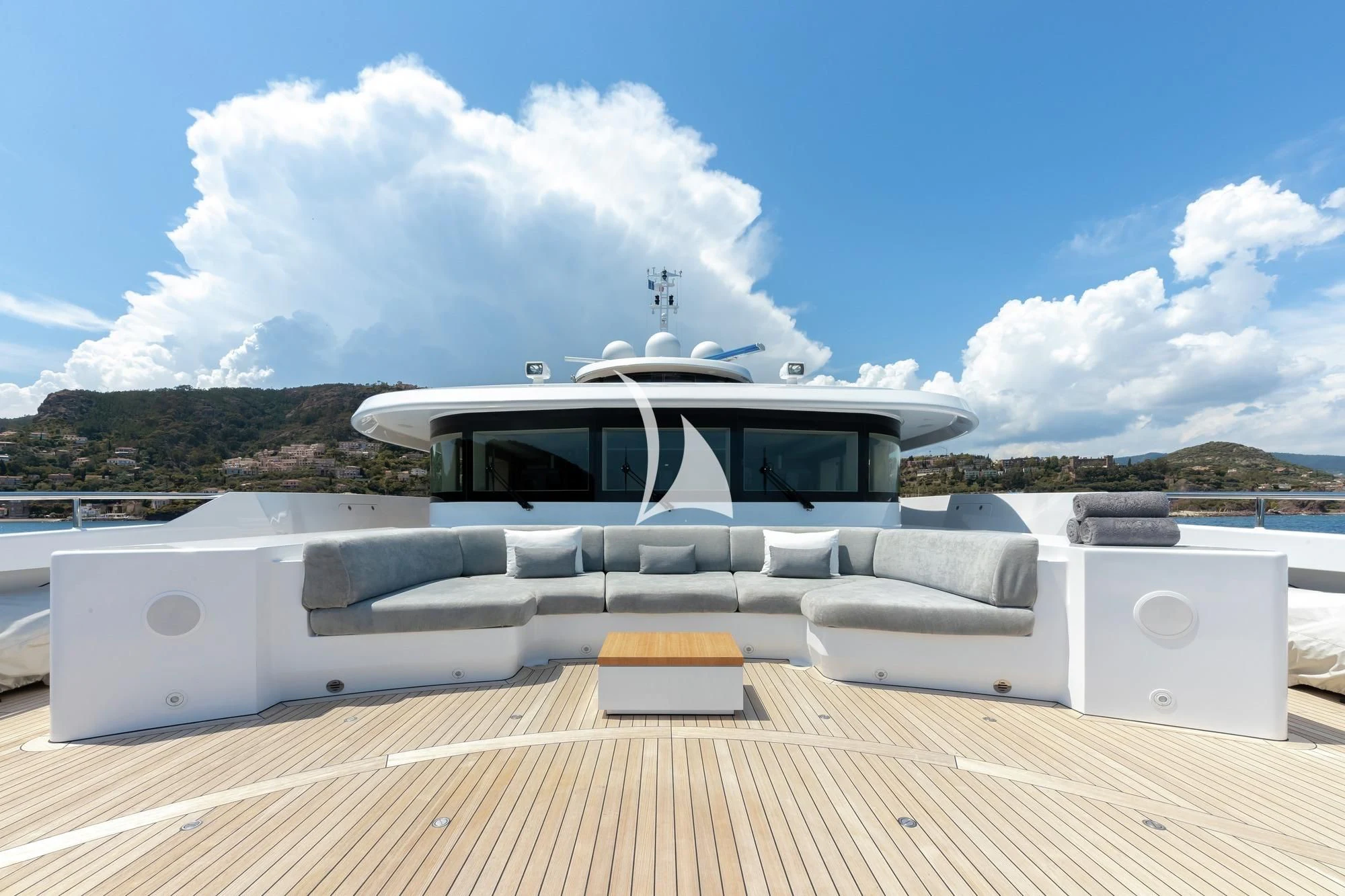 a boat on a deck aboard PEARL Yacht for Sale
