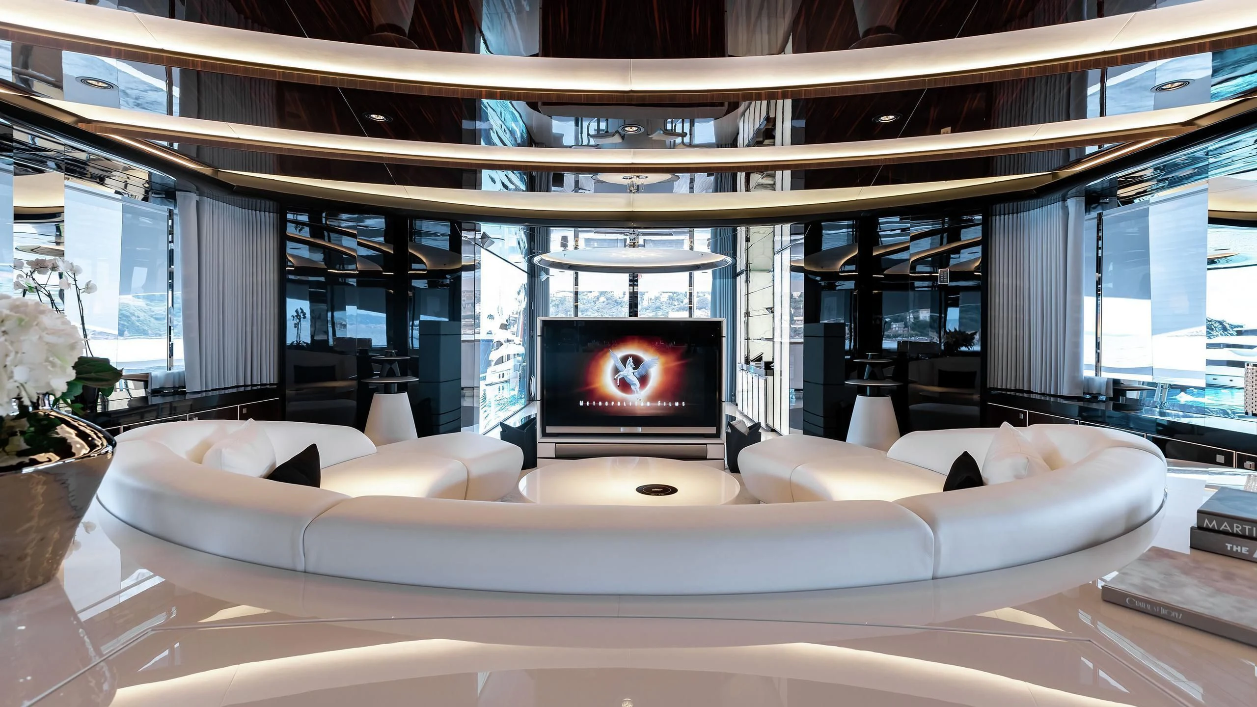 a large white couch in a room aboard PEARL Yacht for Sale