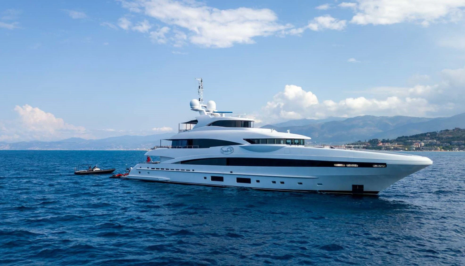 a white yacht in the water aboard PEARL Yacht for Sale
