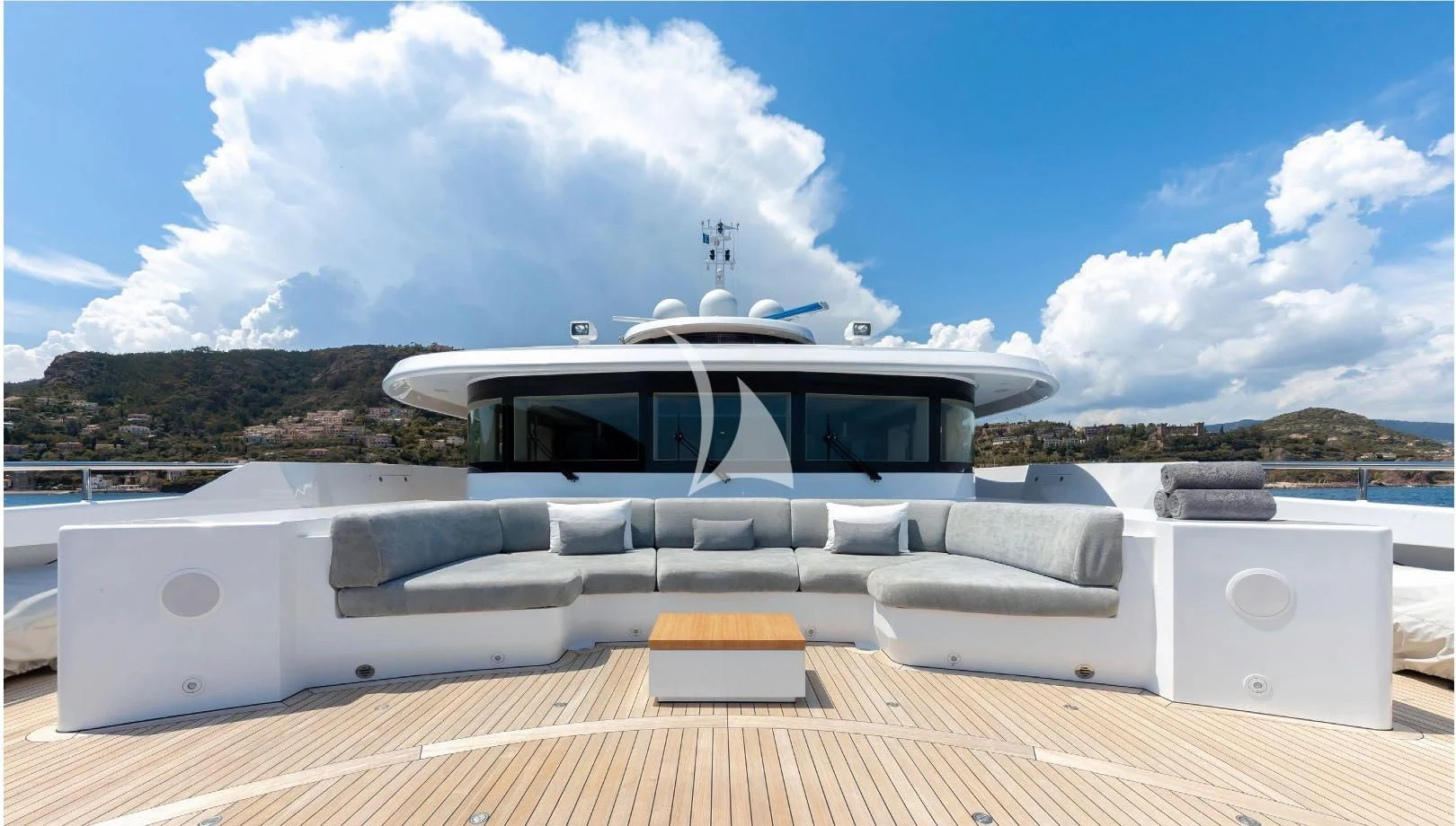 a white boat on a dock aboard PEARL Yacht for Sale