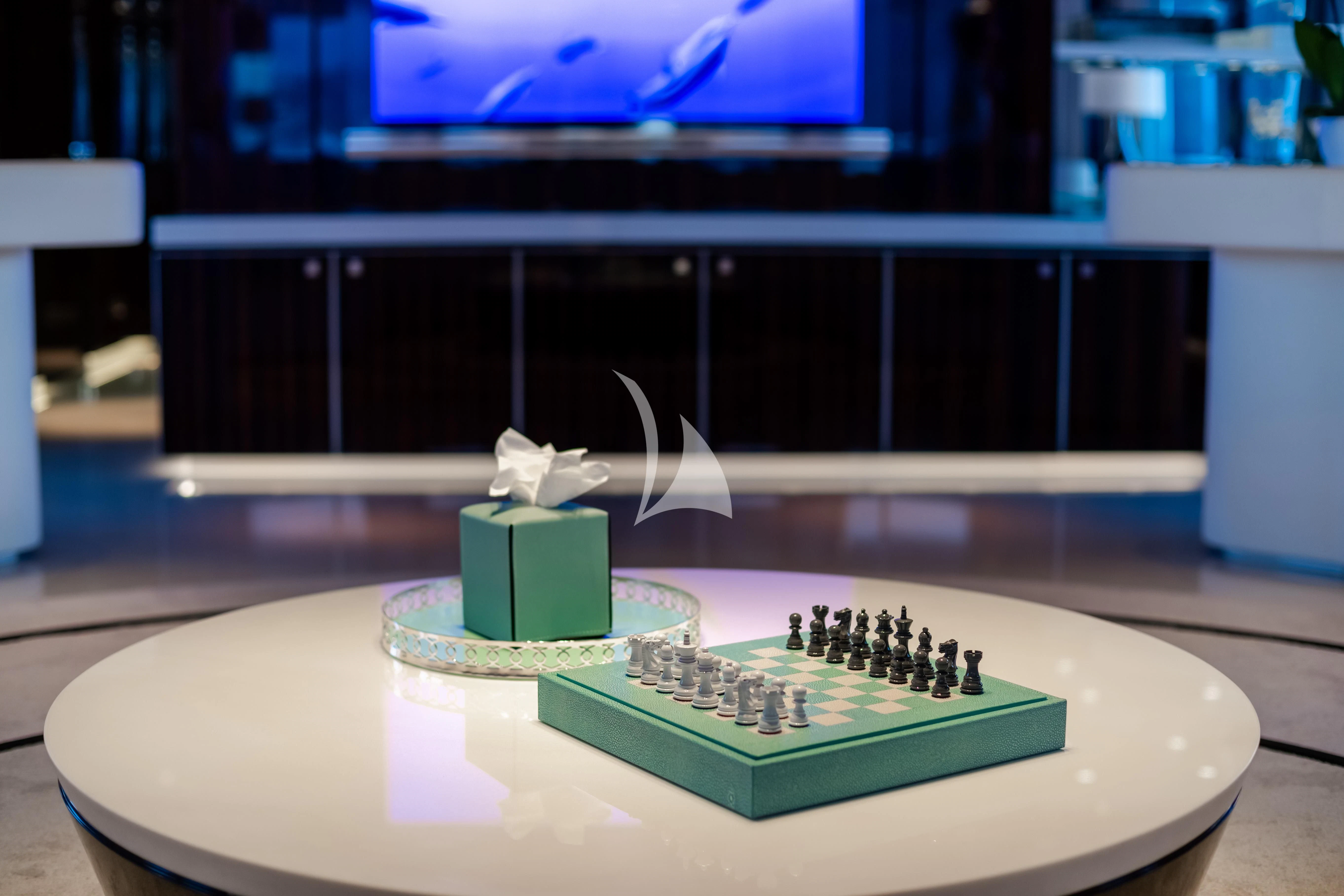 a cake on a table aboard PEARL Yacht for Sale