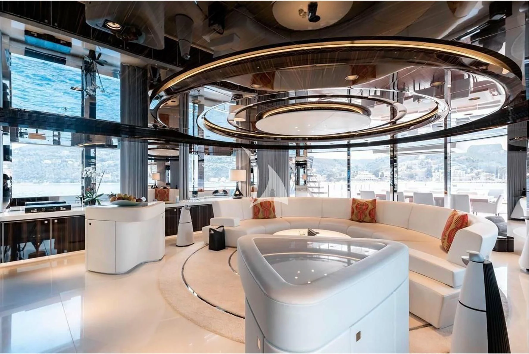 a large room with a large glass ceiling and a large white sofa aboard PEARL Yacht for Sale