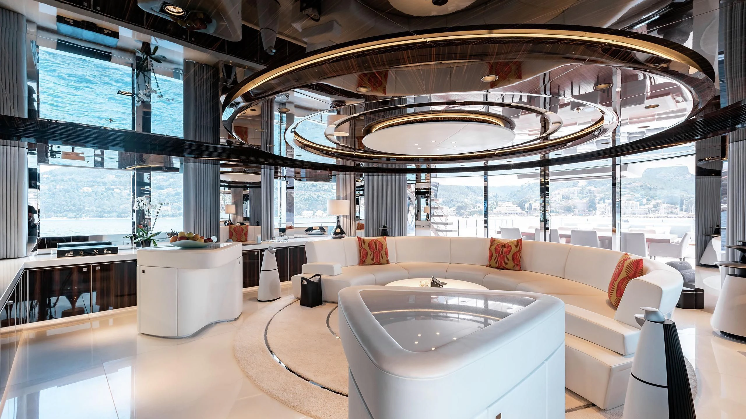 a large room with a large glass ceiling and a large white sofa aboard PEARL Yacht for Sale