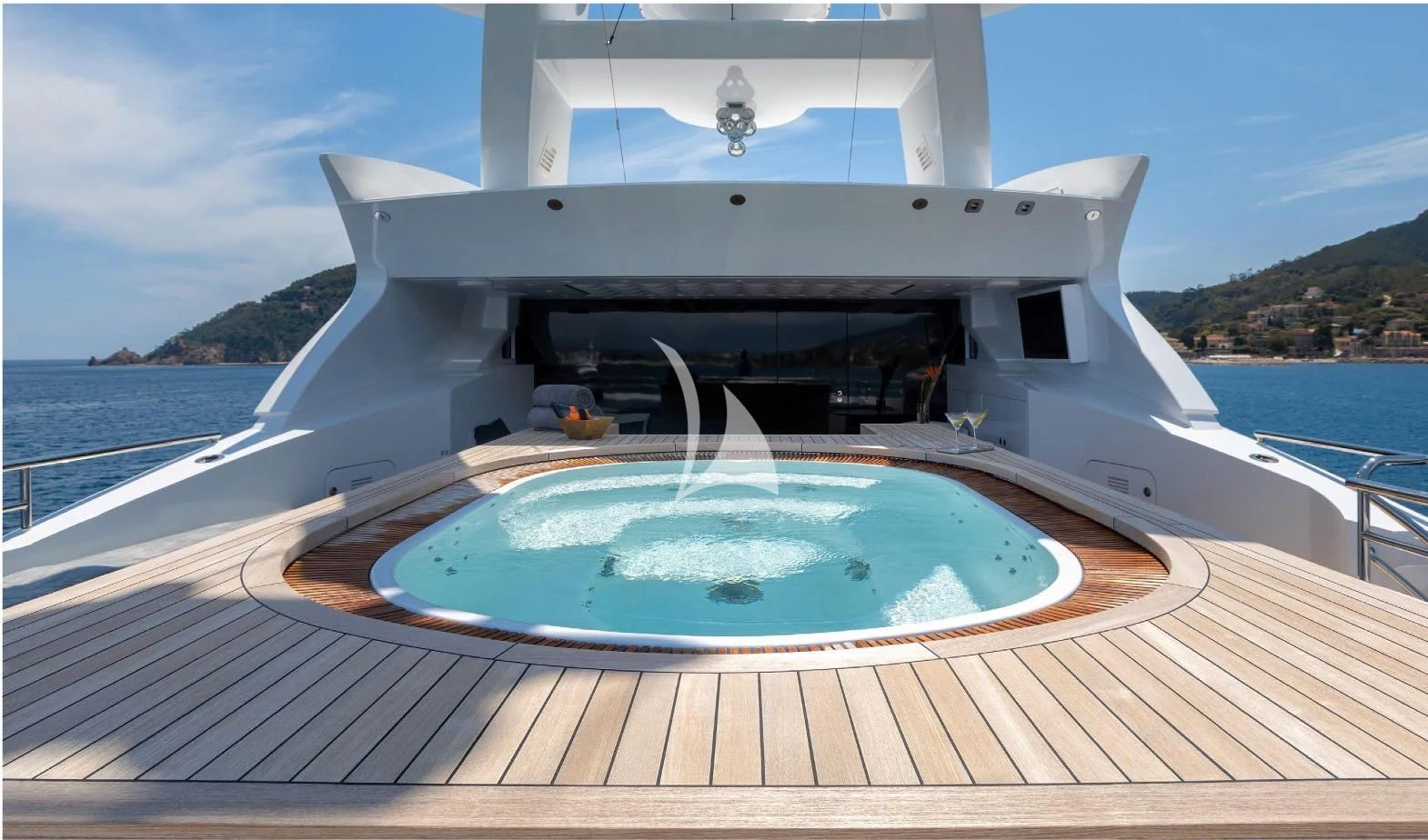 a large white house with a pool aboard PEARL Yacht for Sale