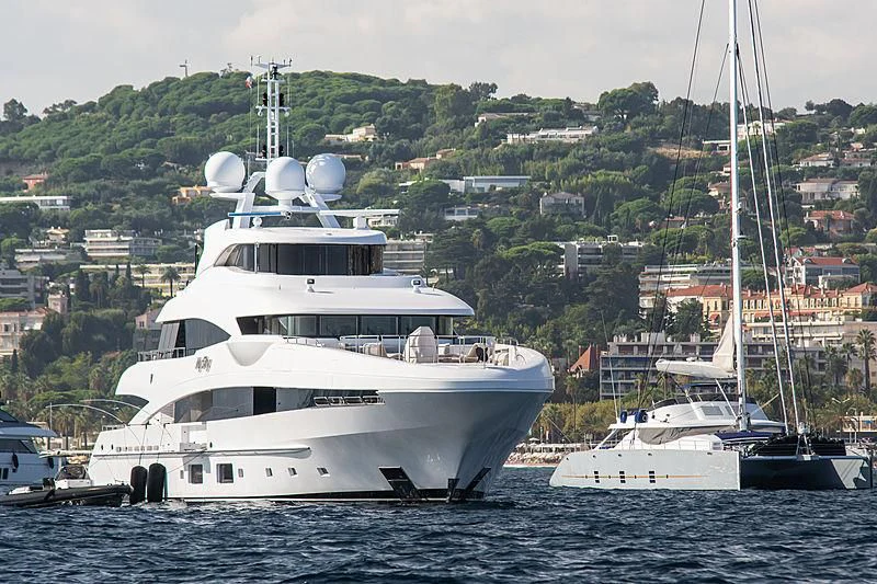a large white boat in the water aboard PEARL Yacht for Sale