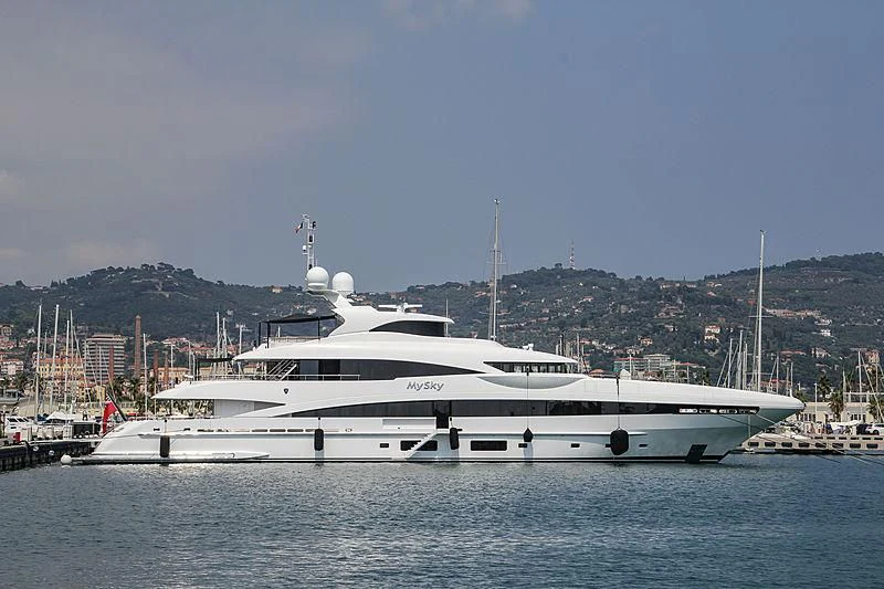 a white yacht in a harbor aboard PEARL Yacht for Sale