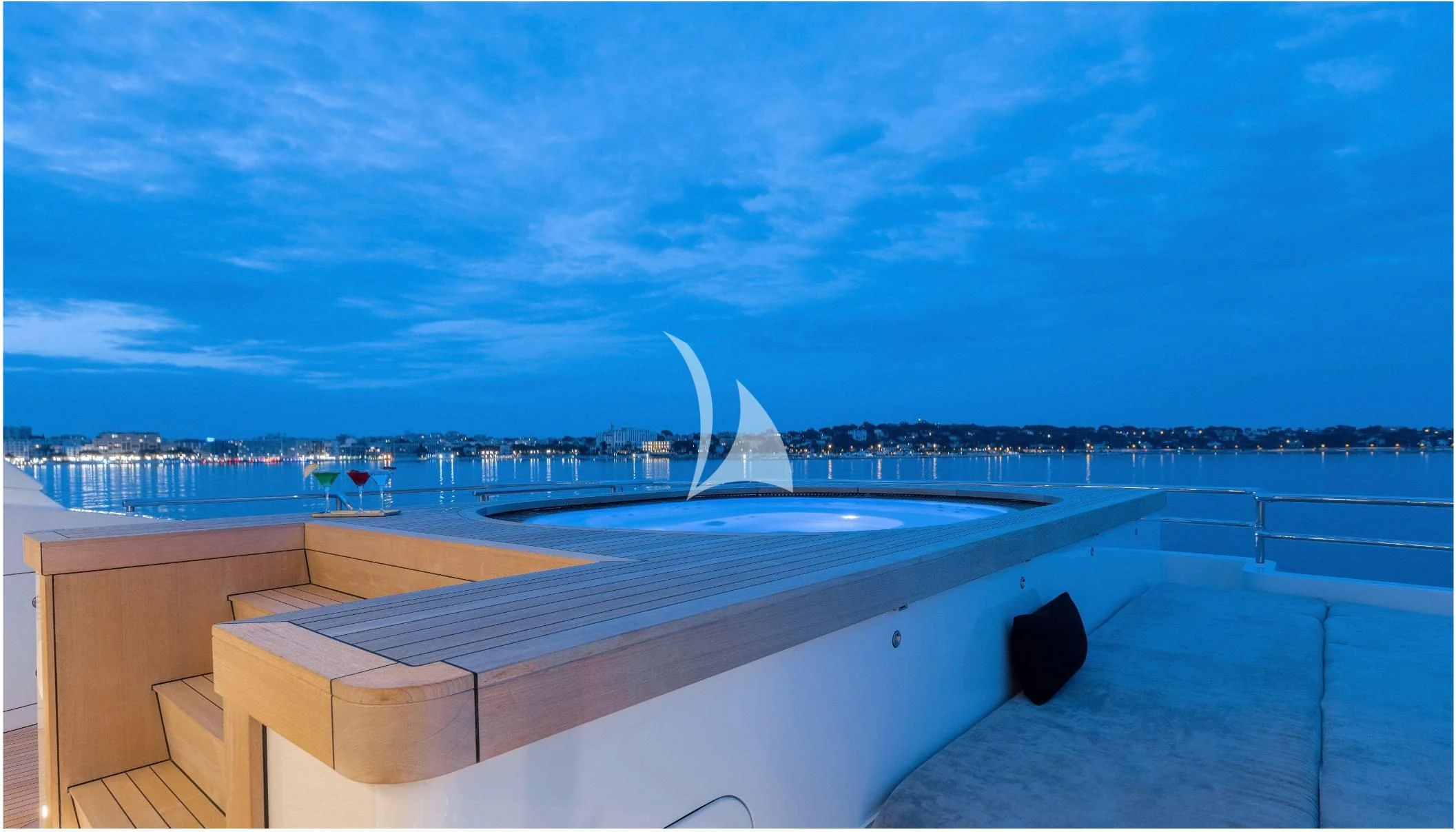 a roof with a water fountain in the background aboard PEARL Yacht for Sale