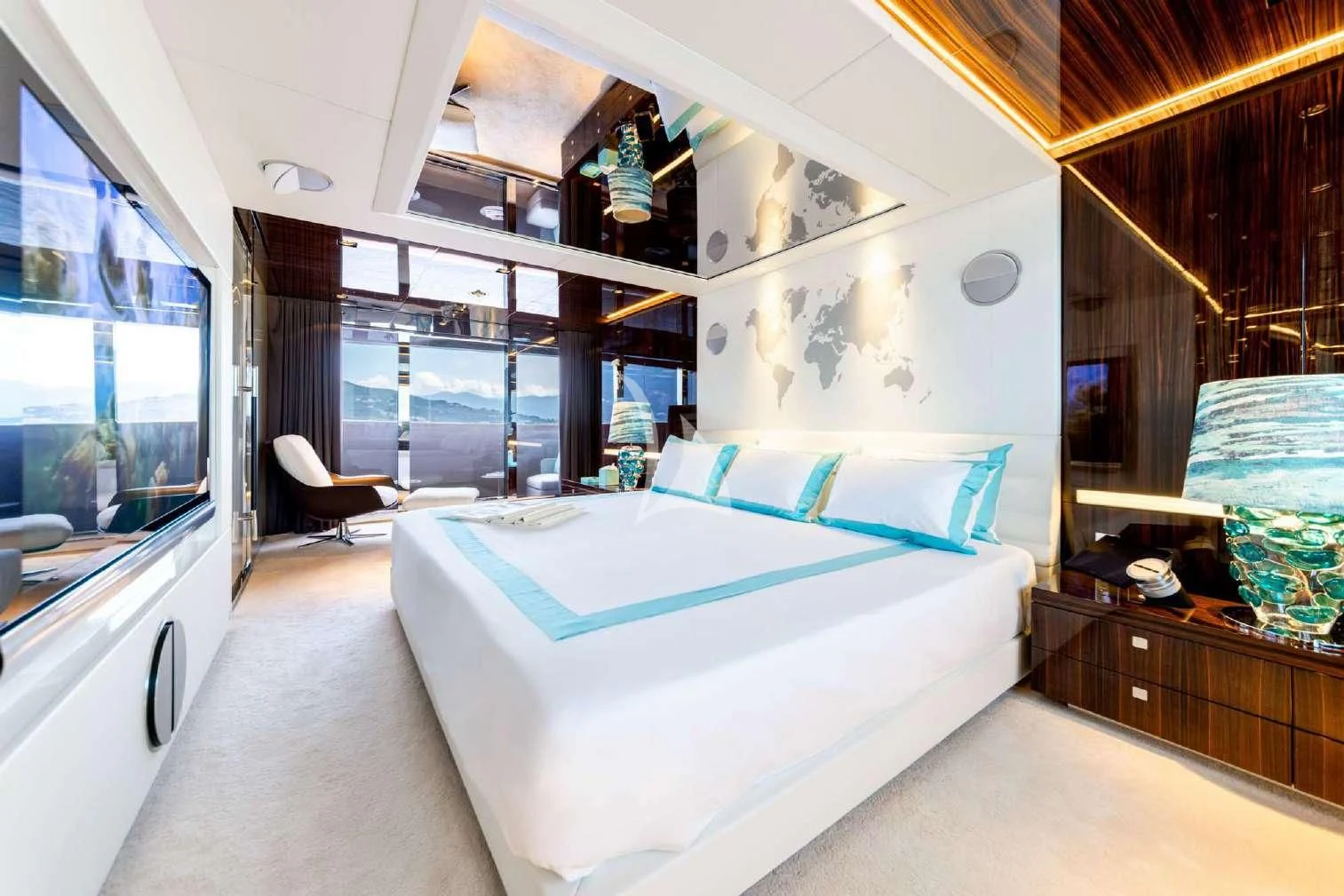 a room with a bed and a window aboard PEARL Yacht for Sale