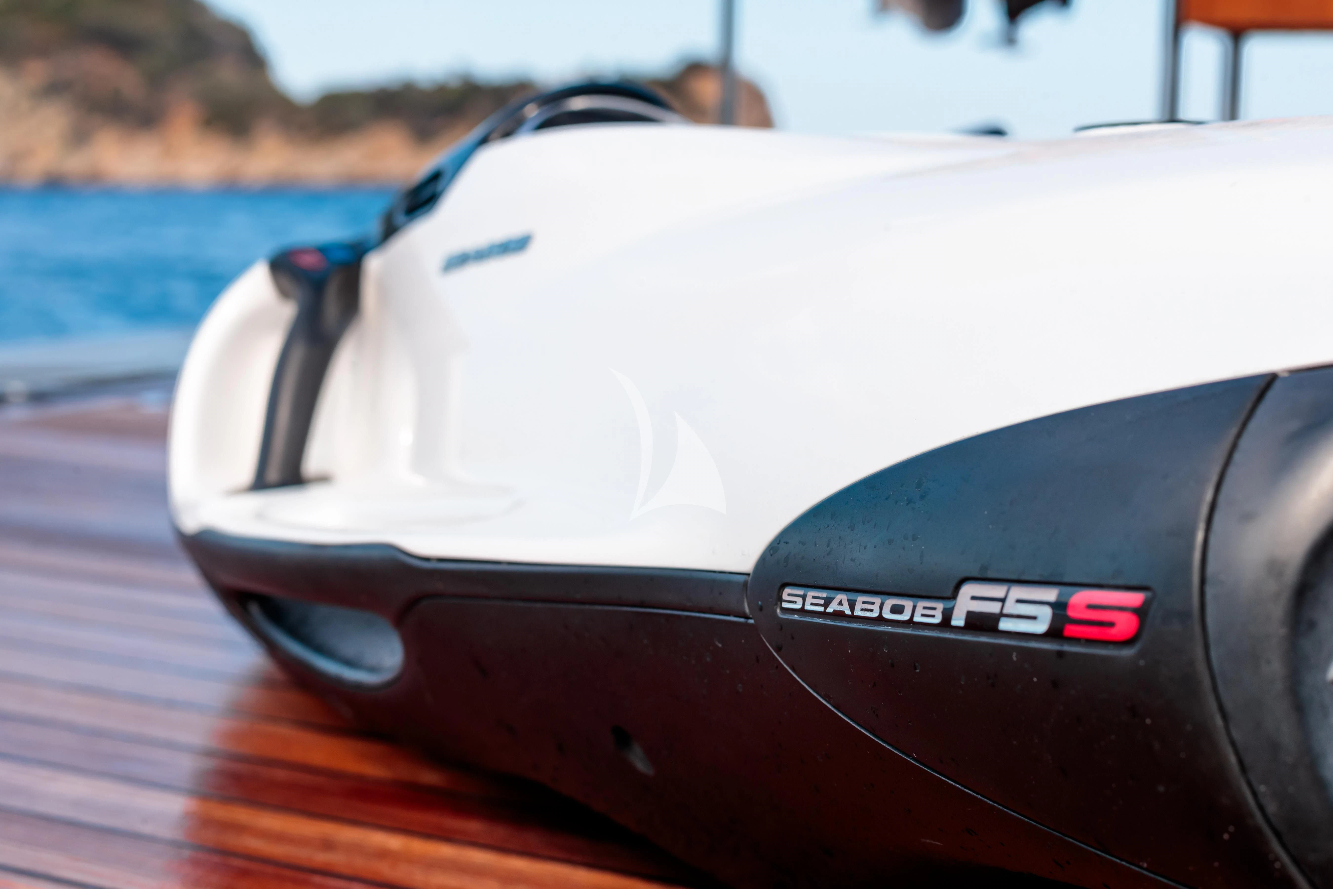 a white sports car aboard PEARL Yacht for Sale