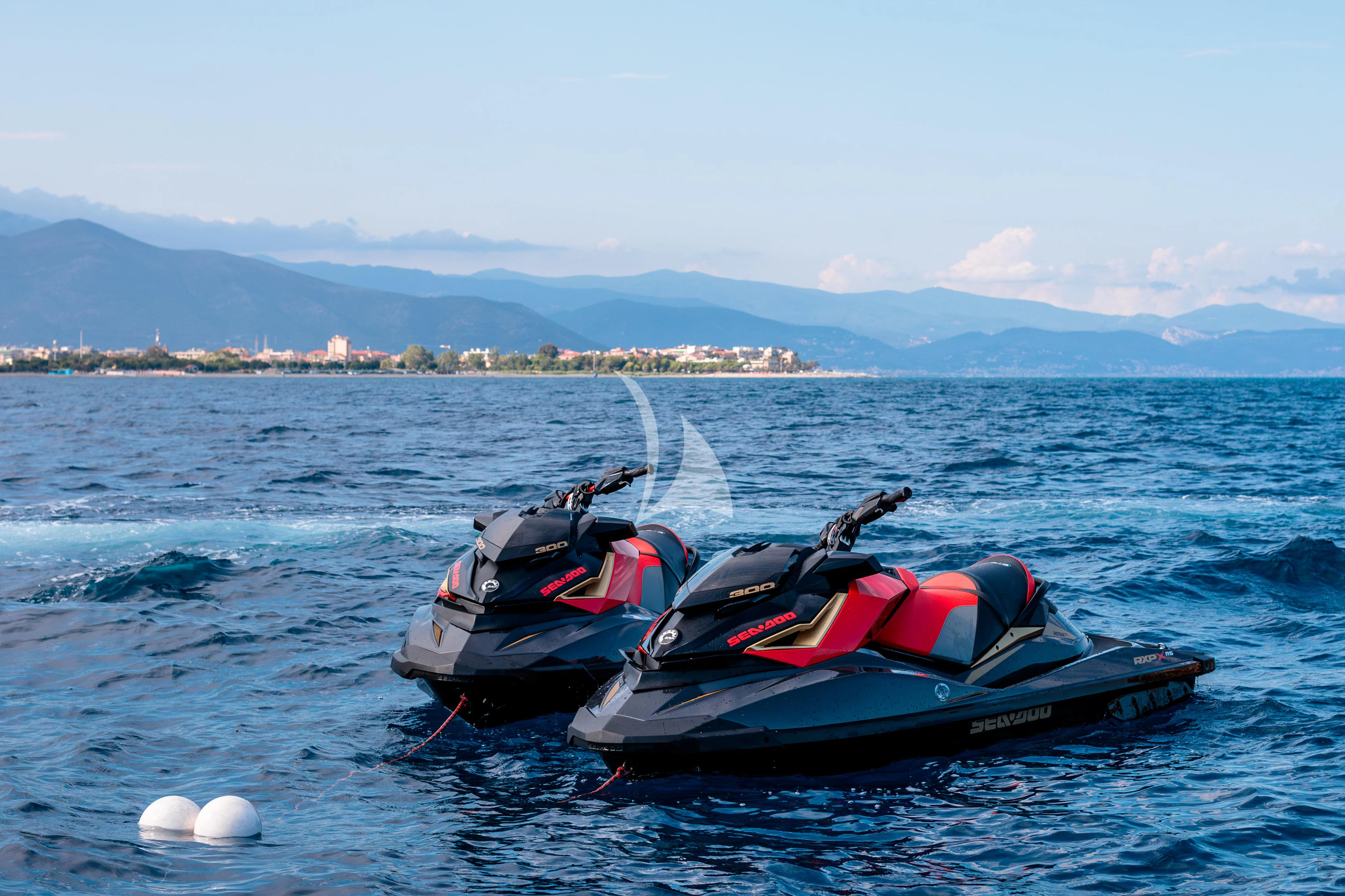 a couple of boats on the water aboard PEARL Yacht for Sale