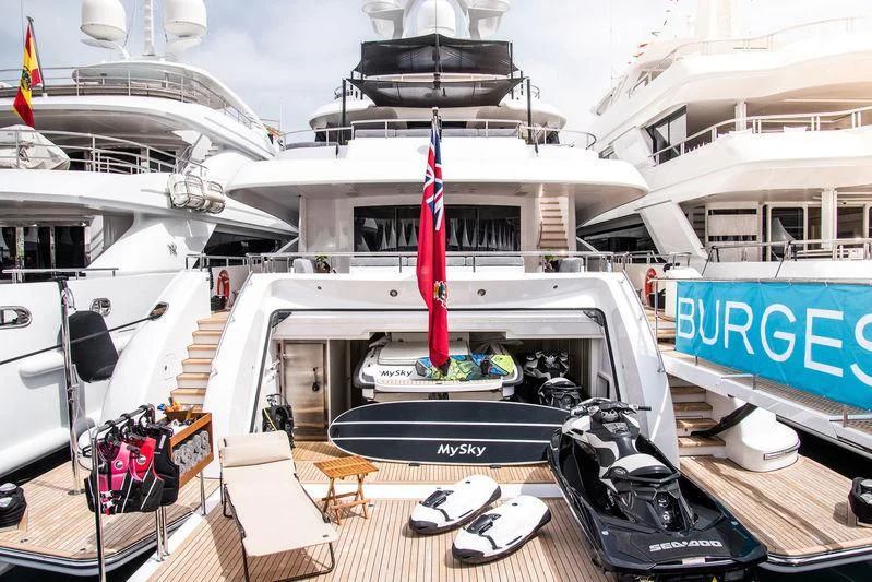 a boat with a flag on the deck aboard PEARL Yacht for Sale
