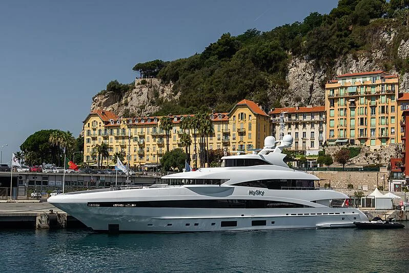 a yacht docked at a pier aboard PEARL Yacht for Sale