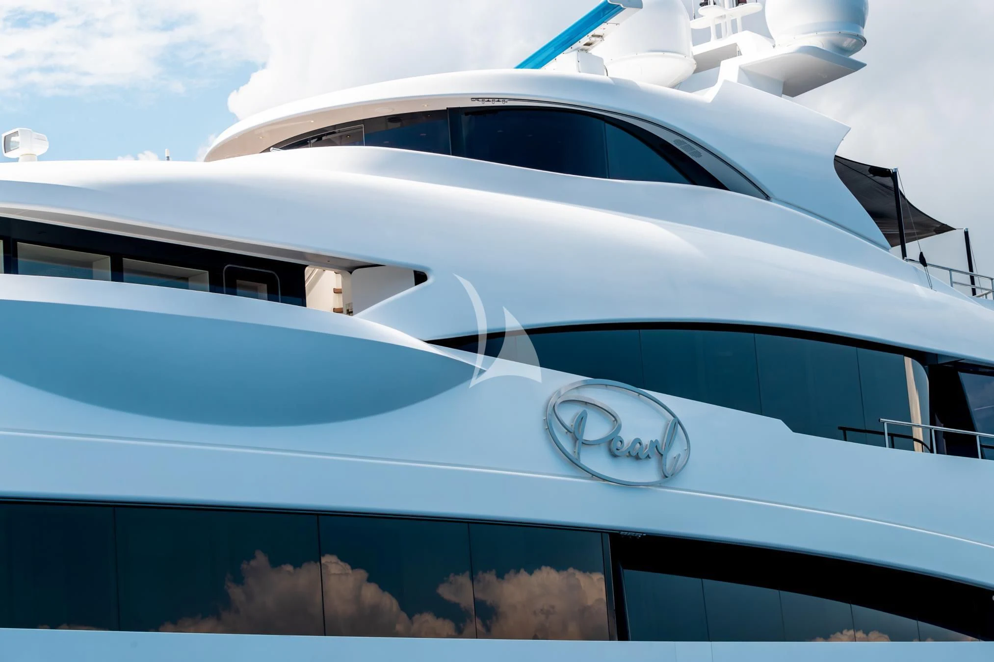 the front of a white car aboard PEARL Yacht for Sale