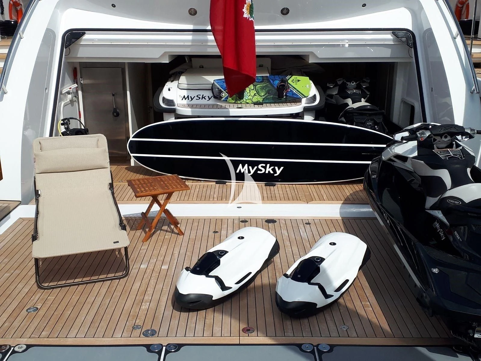 a car with a shoe on the floor aboard PEARL Yacht for Sale