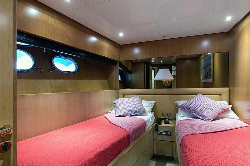 a room with two beds aboard GAVEAU Yacht for Sale