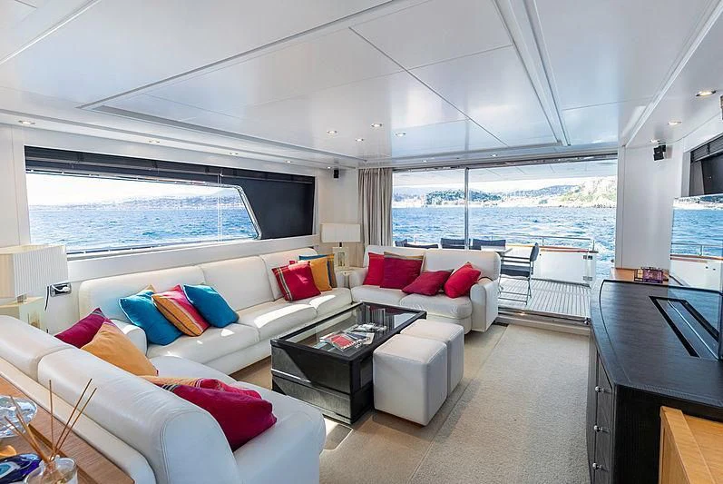 a living room with a large window aboard GAVEAU Yacht for Sale