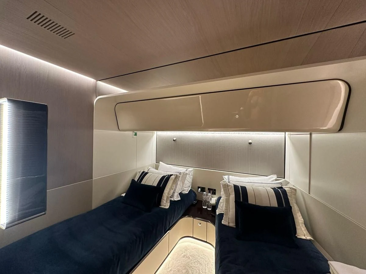 a room with two beds aboard BETTY Yacht for Sale