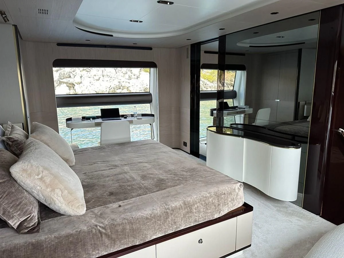 a bed in a room aboard BETTY Yacht for Sale