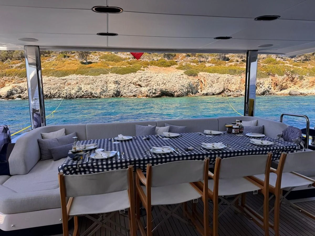 a table set for a meal aboard BETTY Yacht for Sale