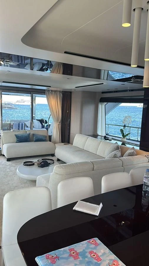 a living room with a couch and a table aboard BETTY Yacht for Sale