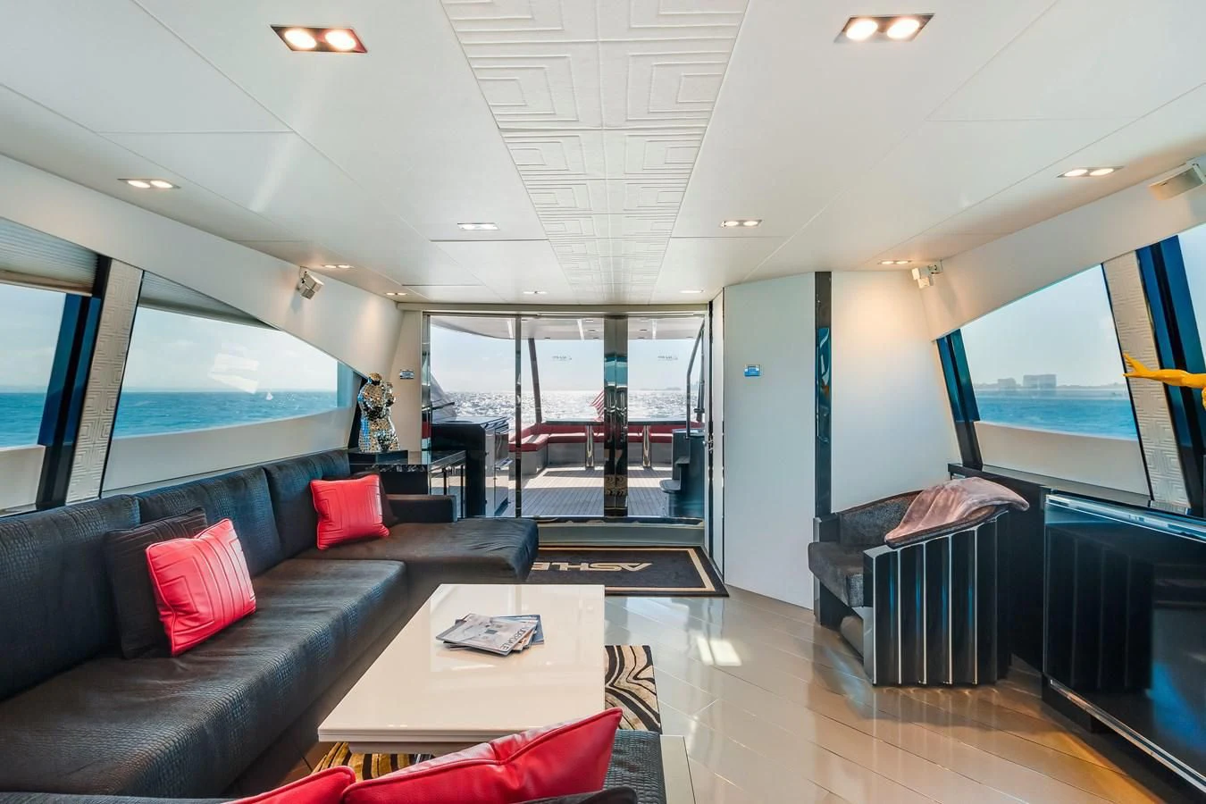 a living room with a large window aboard ASHLEY Yacht for Sale