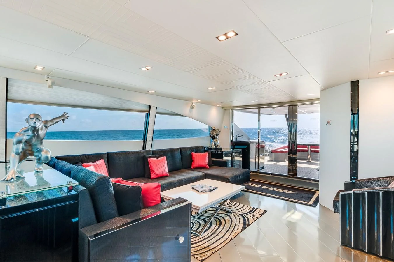 a living room with a large glass wall aboard ASHLEY Yacht for Sale