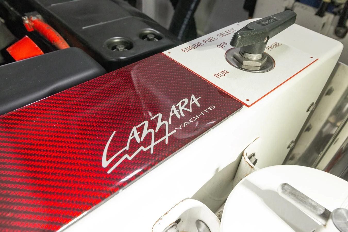 a red and white box with a white label on it aboard ASHLEY Yacht for Sale