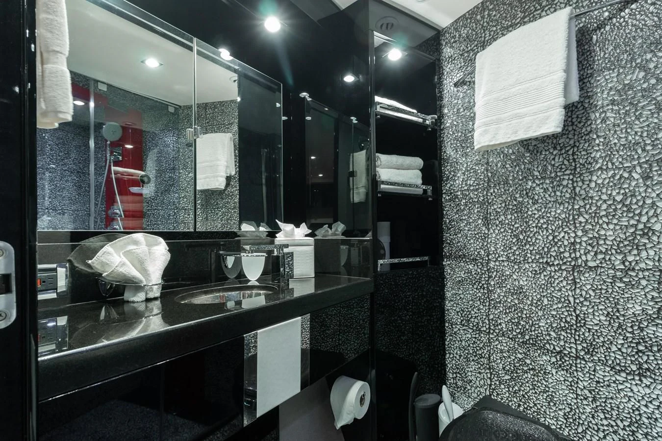 a bathroom with a large mirror aboard ASHLEY Yacht for Sale