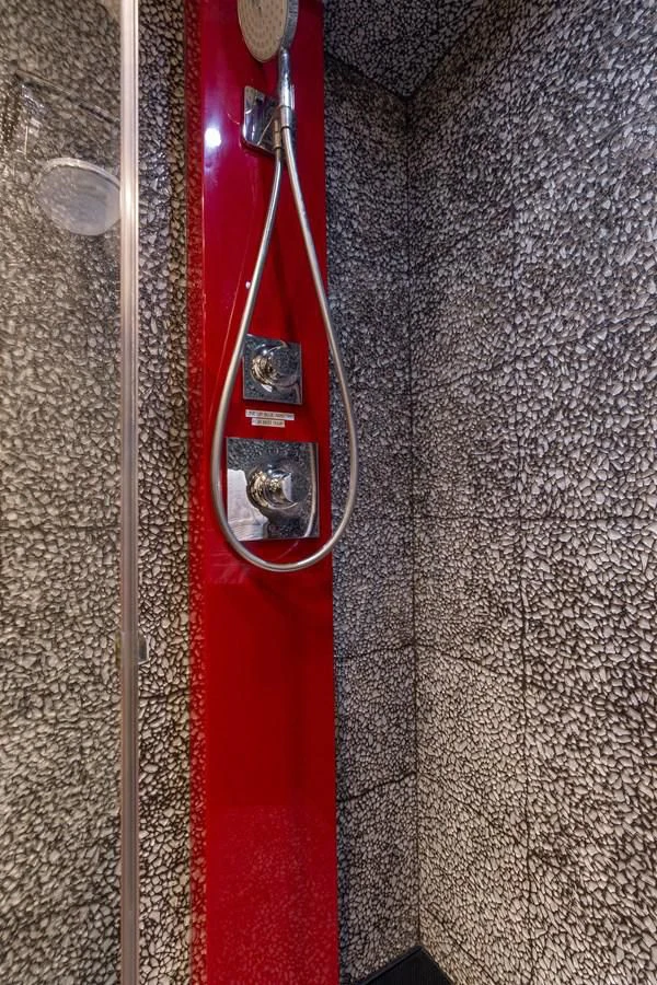 a red electric guitar aboard ASHLEY Yacht for Sale