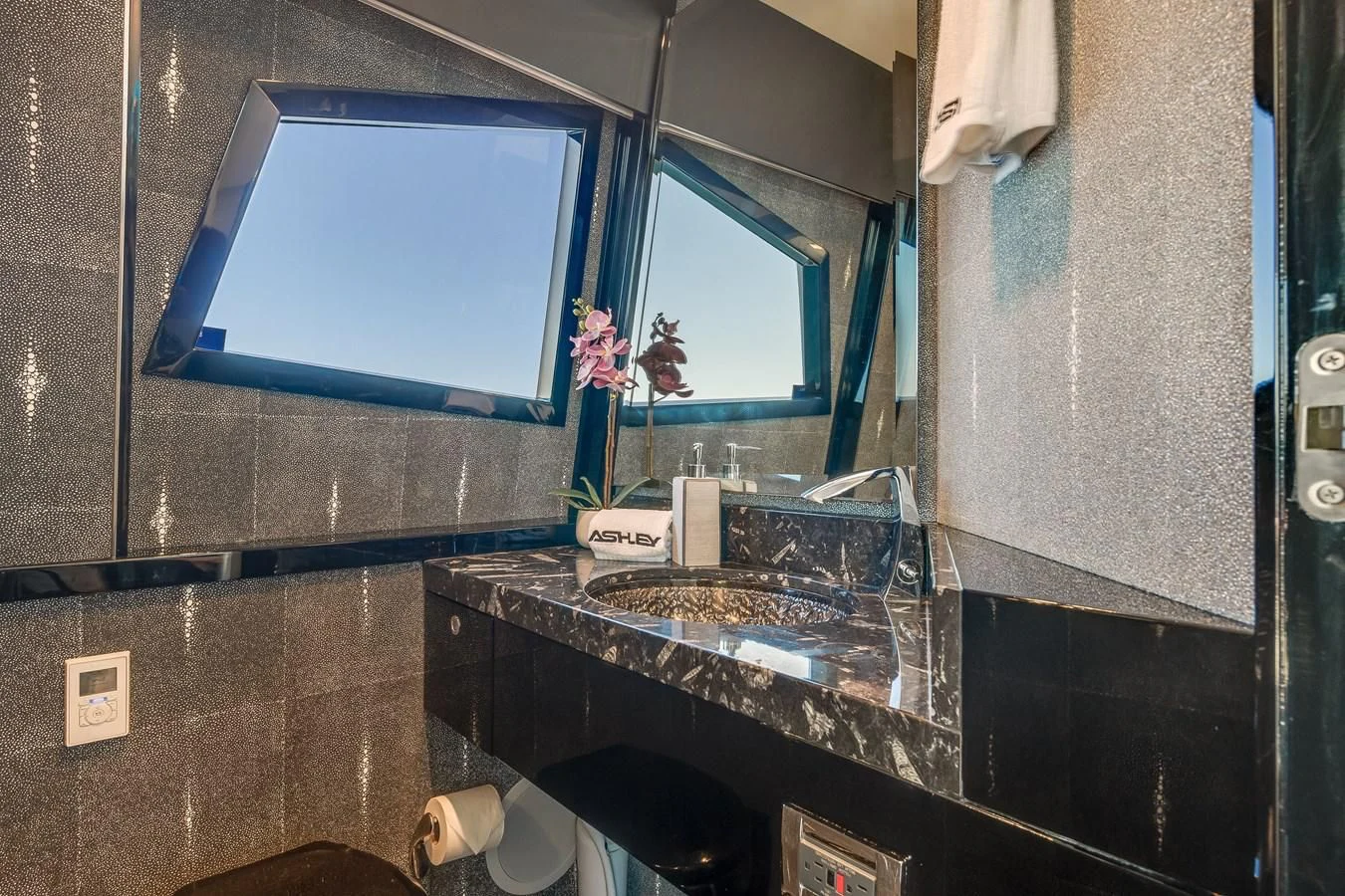 a bathroom with a large mirror aboard ASHLEY Yacht for Sale