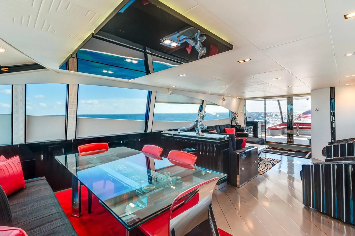 a room with a table and chairs aboard ASHLEY Yacht for Sale