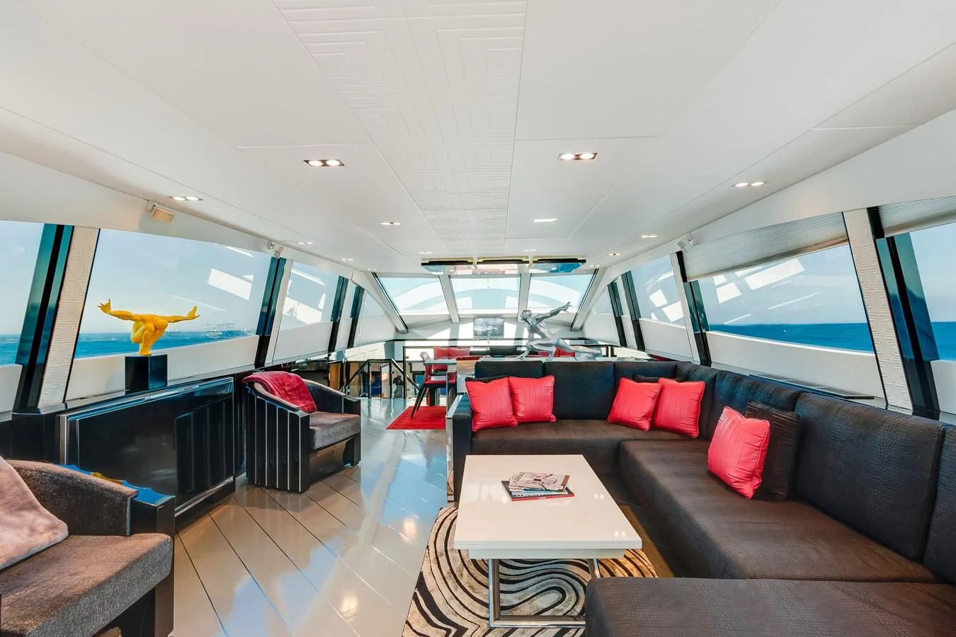 a living room with a couch and a table aboard ASHLEY Yacht for Sale