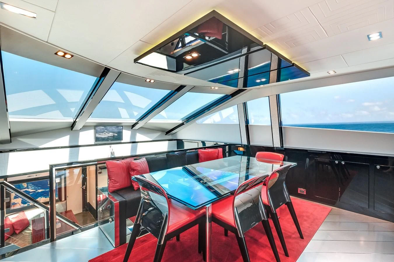 inside of a building with red chairs aboard ASHLEY Yacht for Sale